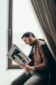 reading fashion magazine